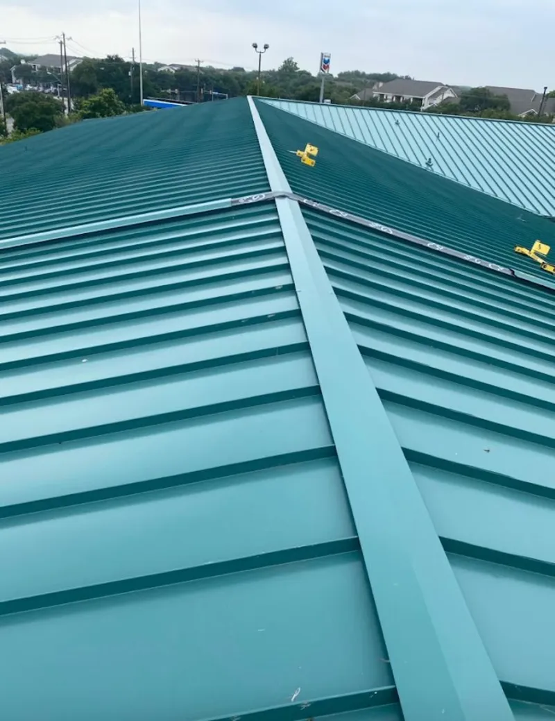 Green commercial metal roof ridge and valley for Metal Roof Repair in Holly