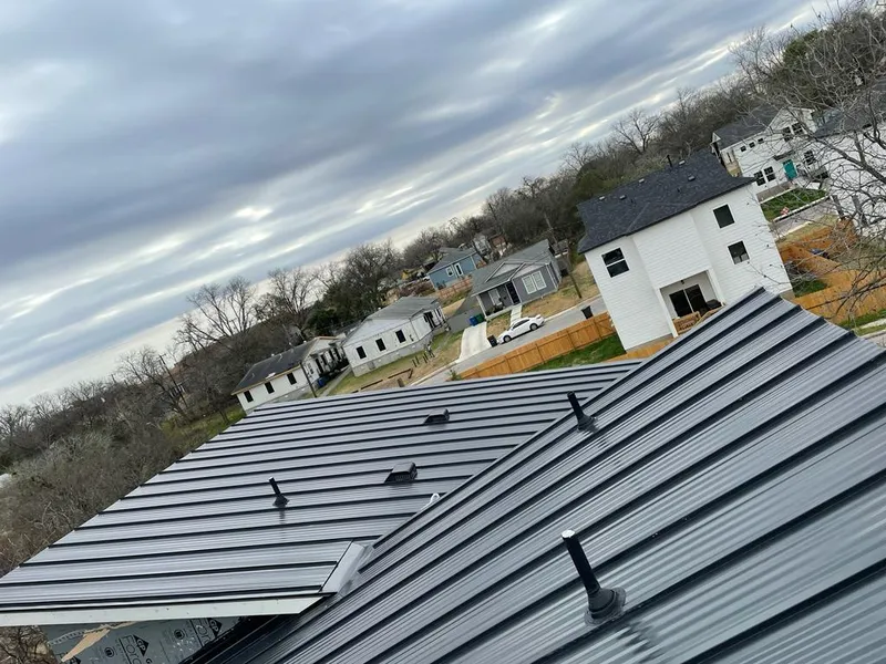 Standing seam metal roof panels with vents for Skylight Repair in Holly